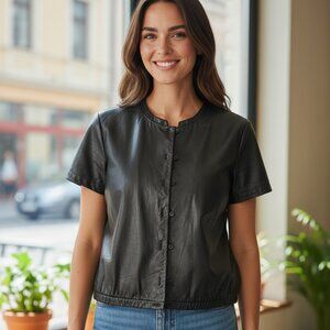 Vintage 1990s Calvin Klein (CK) short-sleeve leather jacket.